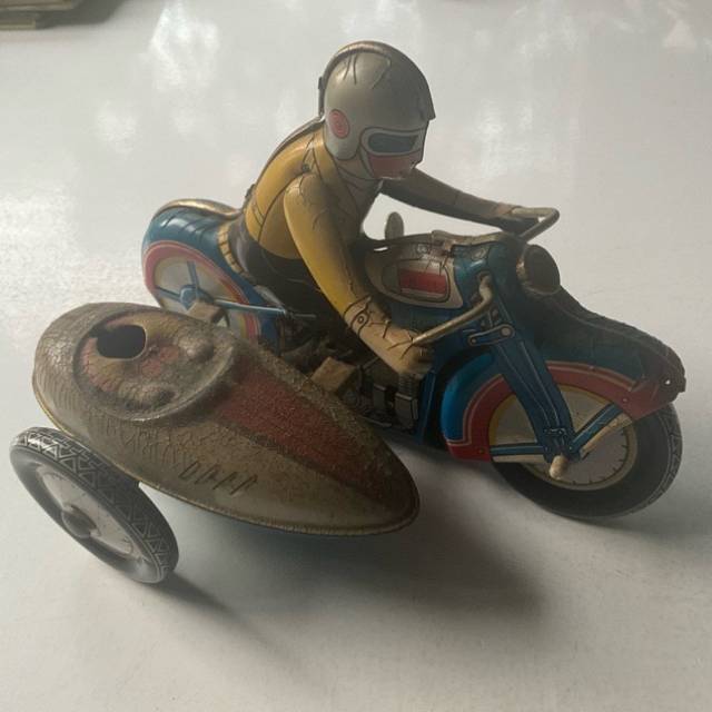 TINPLATE MOTORCYCLE WITH SIDECAR WIND-UP TOY...